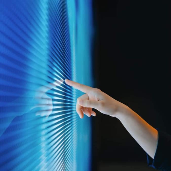 Image of hand using a digital screen
